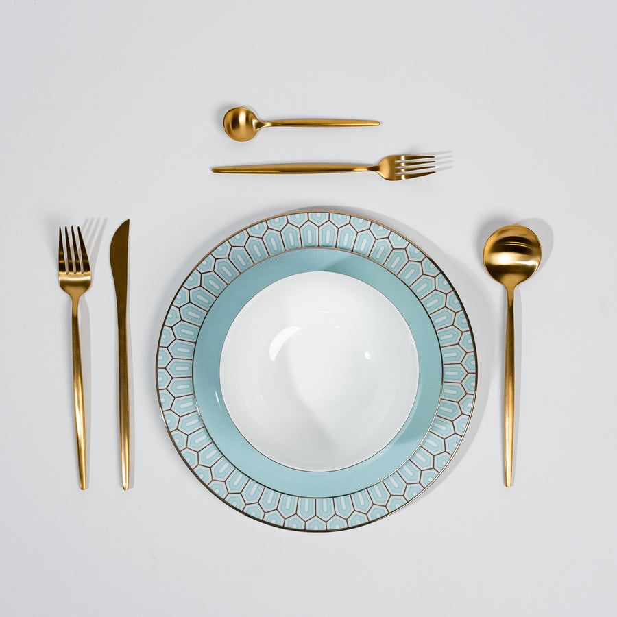 An Ozarke Tiffany Blue Plate set on a white background